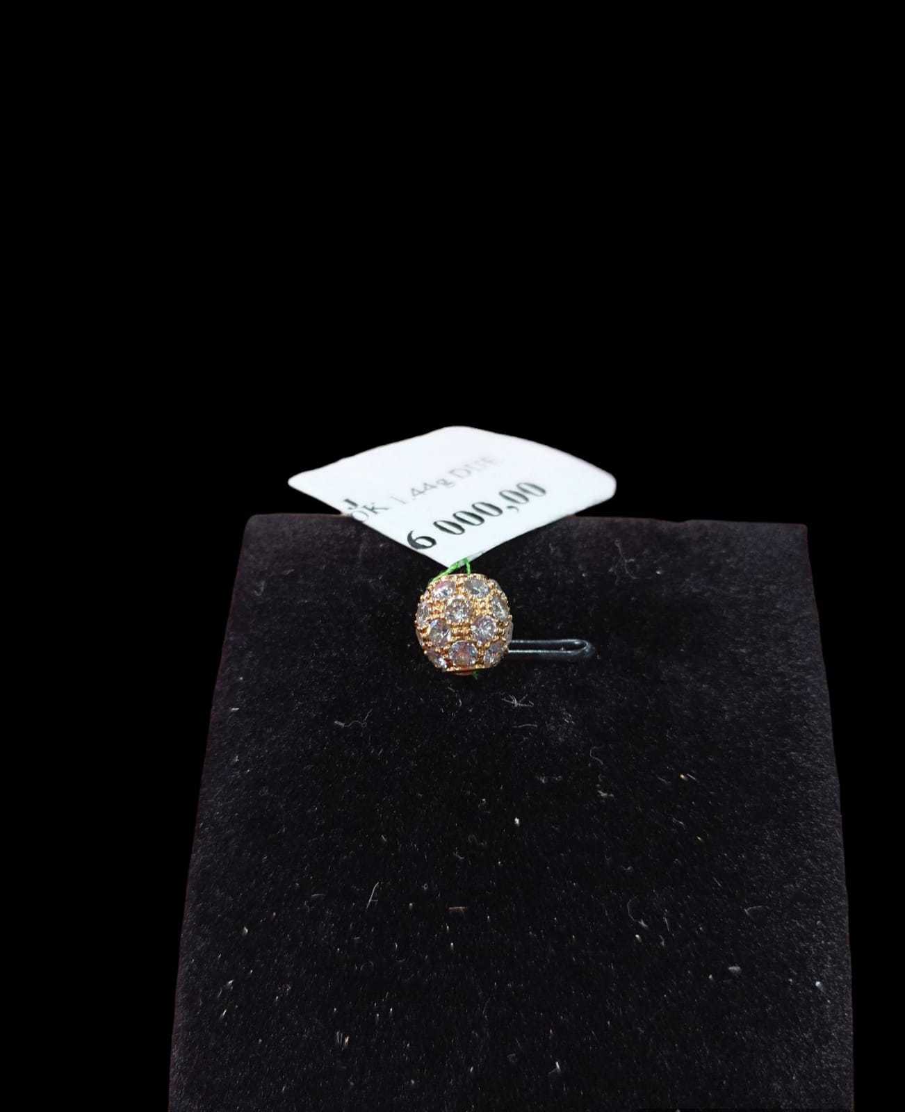 Precio 36 000,00   Dije bola de fuego 1.44 g 10k