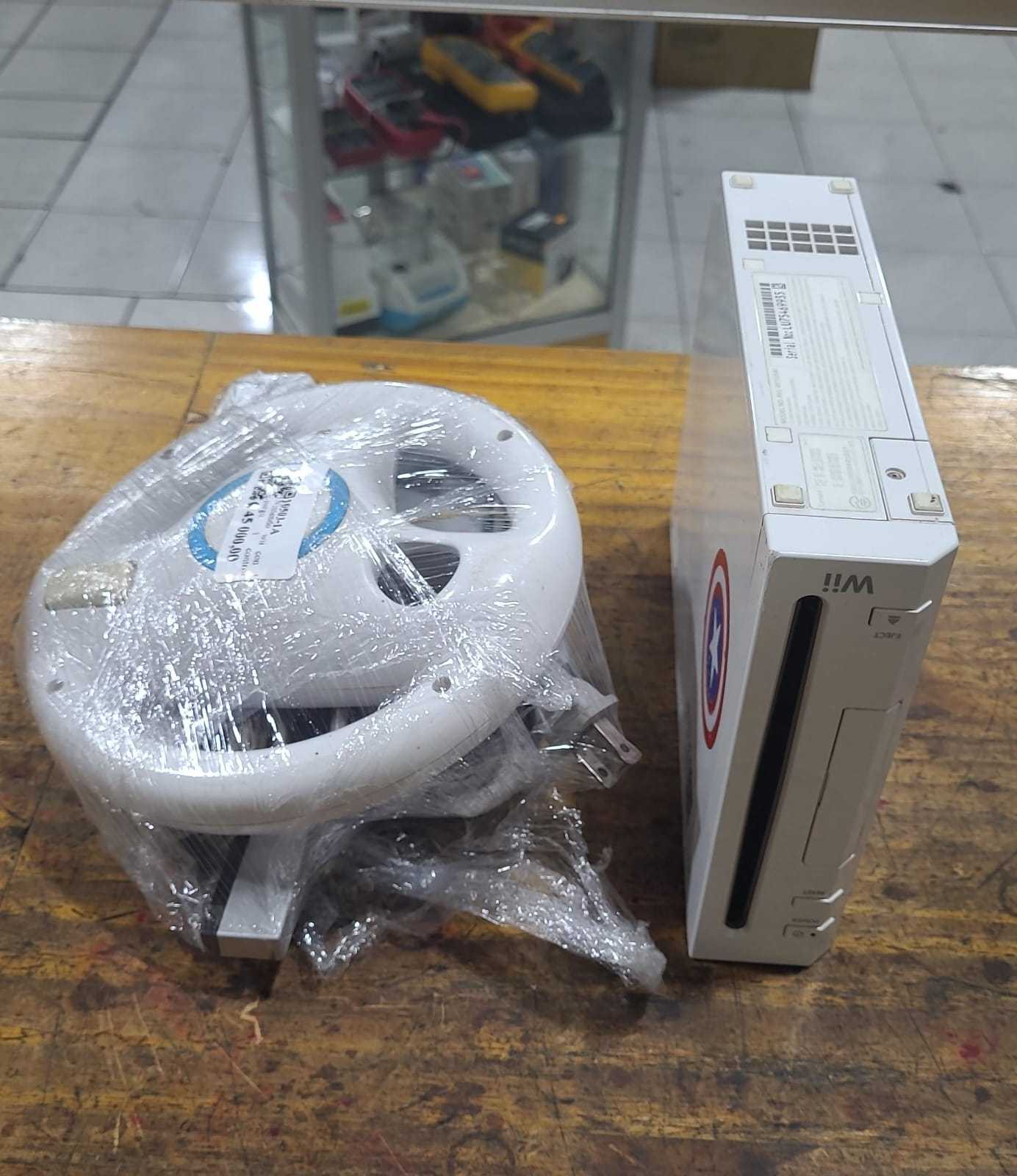 Precio 50 000,00 nintendo wii Consola con 1 juego,  1 control, 1 volante  y la base y sus cables
