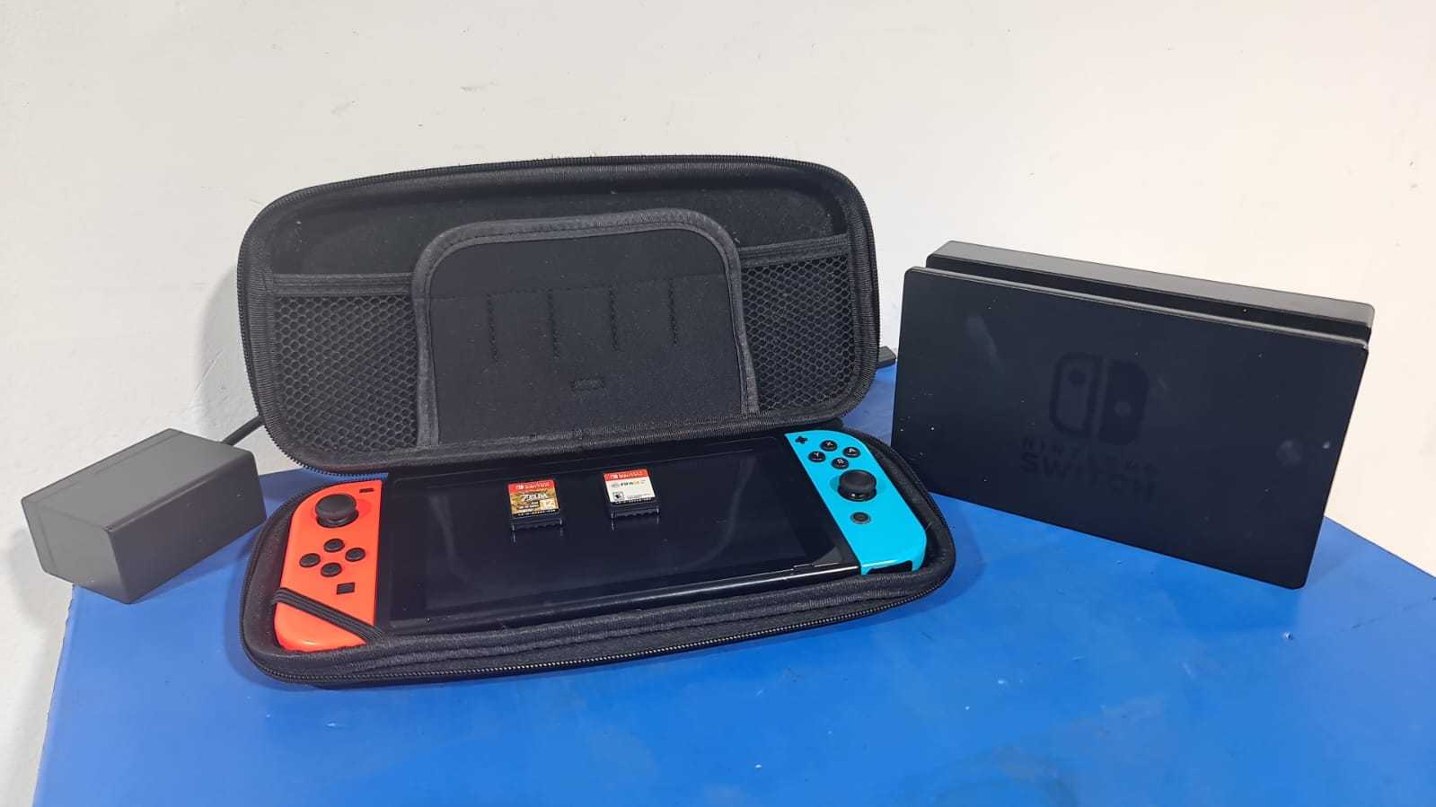 Precio 155 000,00 NINTENDO V2 COSOLA SWITCH  CON ACCESORIOS CON 2 JUEGOS