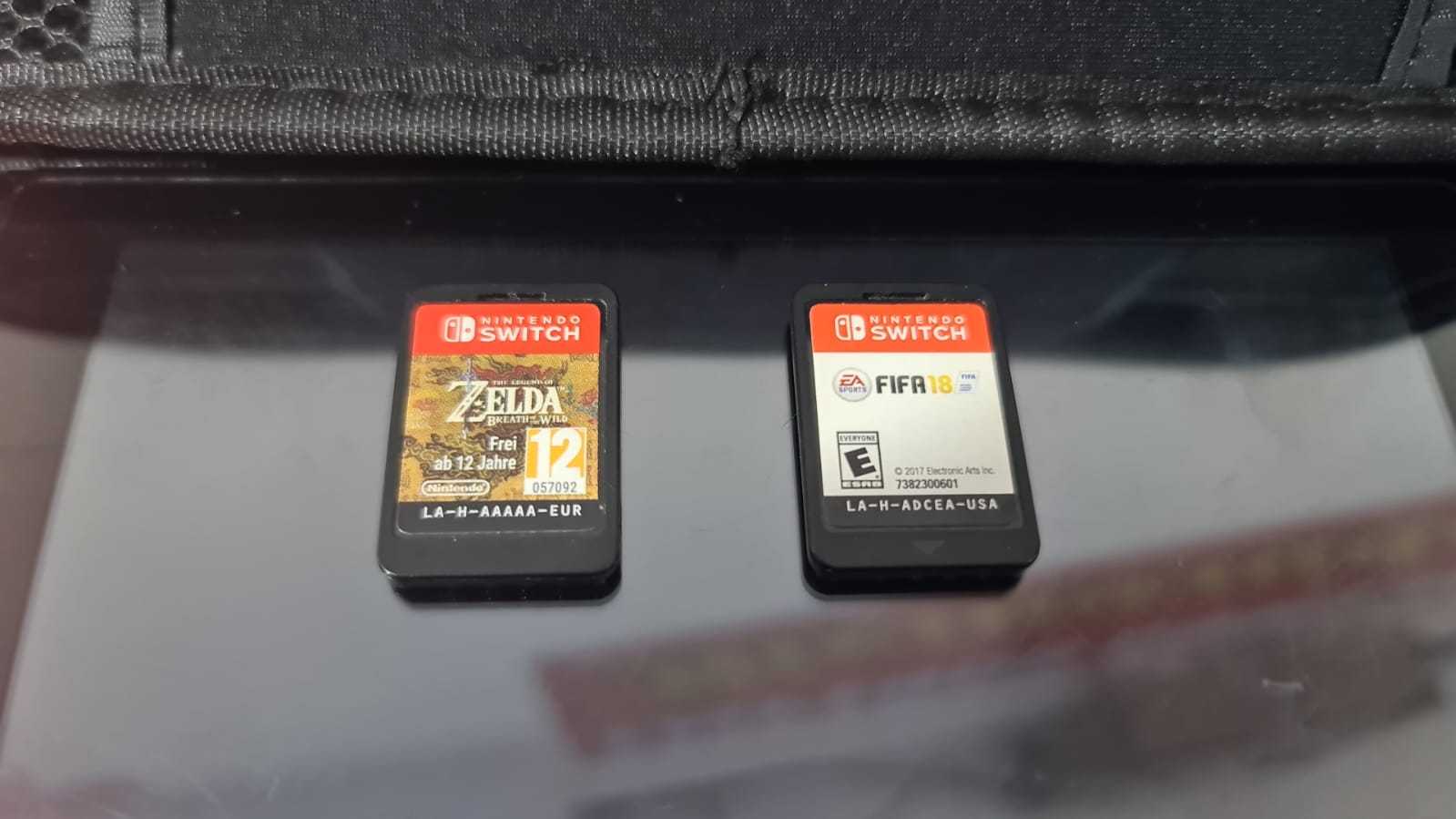 Precio 155 000,00 NINTENDO V2 COSOLA SWITCH  CON ACCESORIOS CON 2 JUEGOS