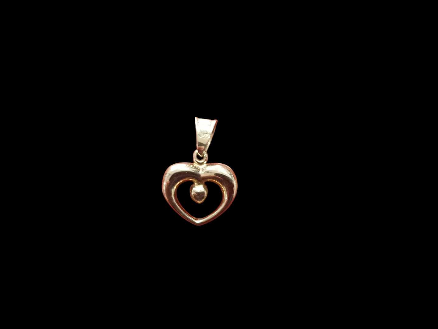 Precio 49 000,00   Dije doble corazon