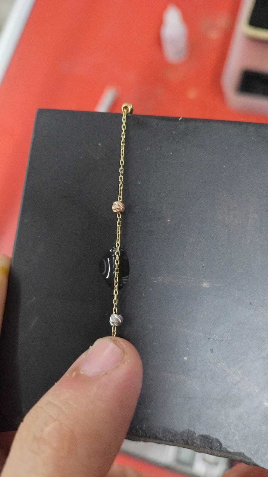 Precio 137 500,00   Rosario de con dije de cruz con piedras blancas