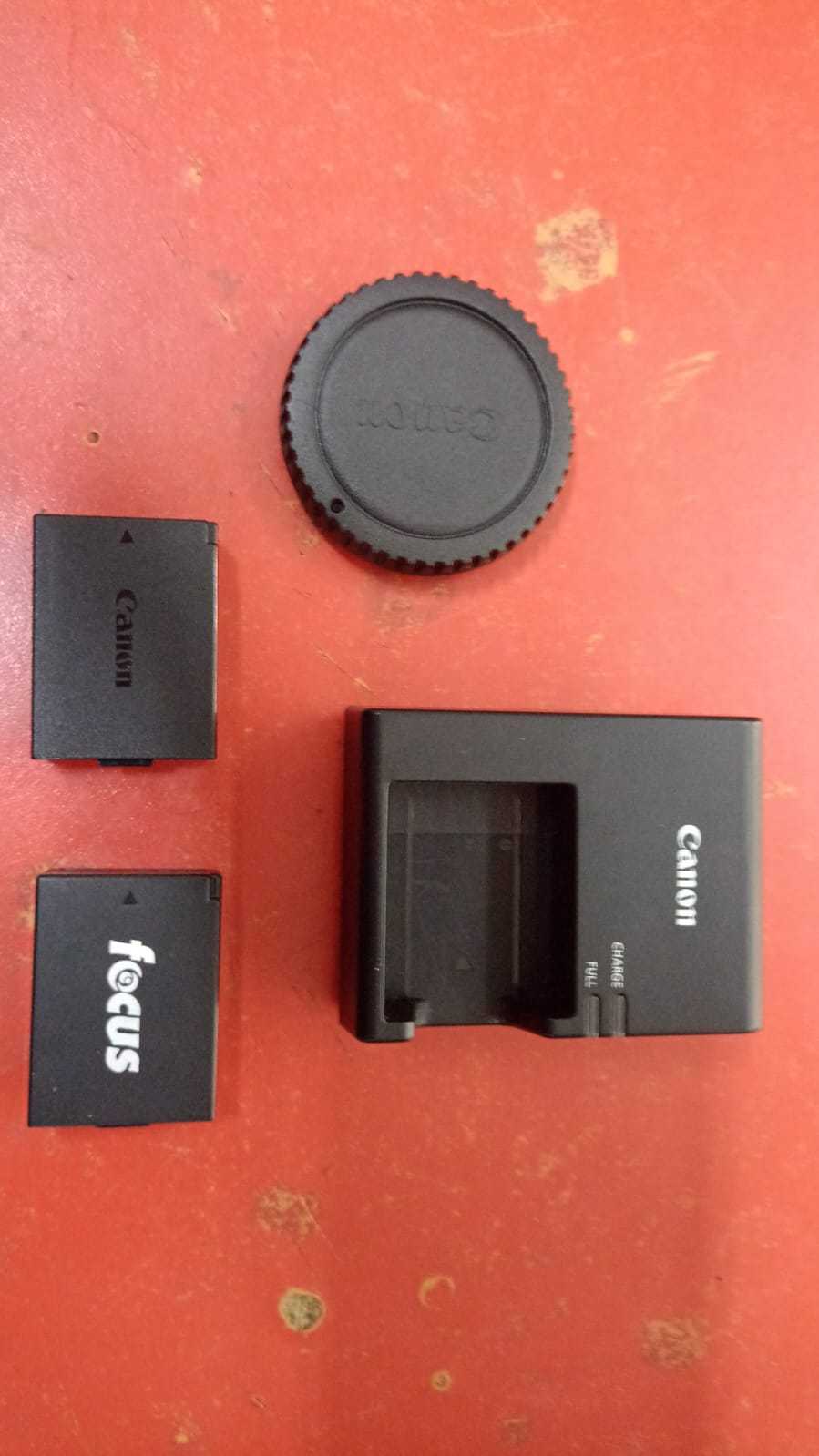 Precio 140 000,00 canon t5 camara fotografica con cargador y 2 baterias  estuche