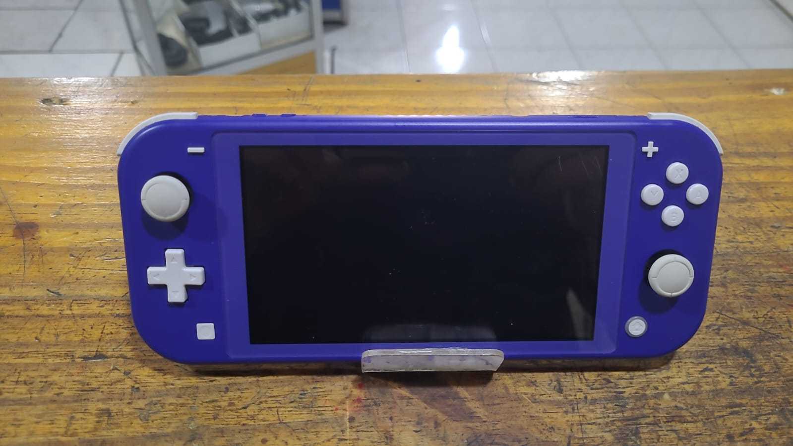 Precio 70 000,00 Nintendo switch lite Consola con cargador