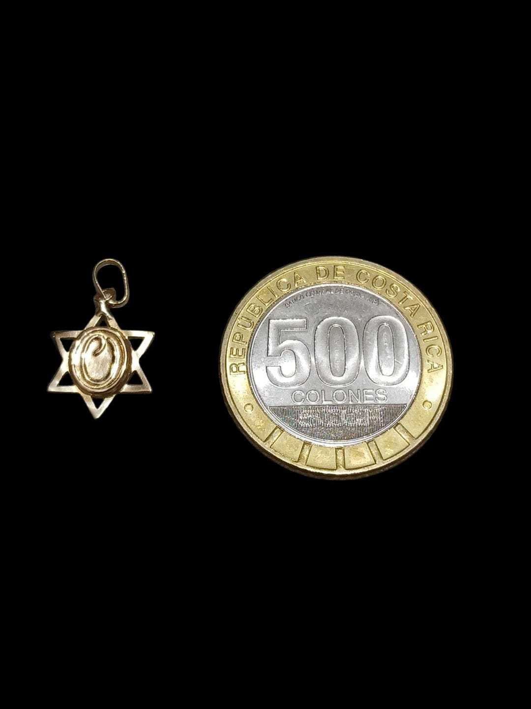 Precio 16 500,00   dije de estrella