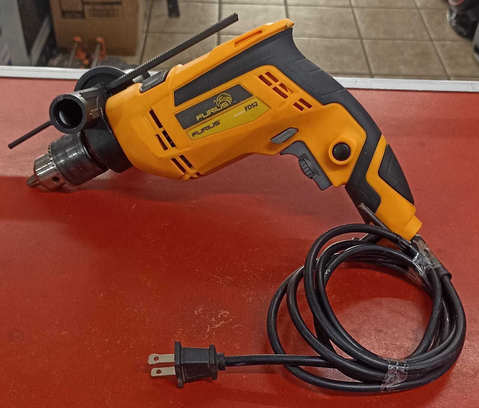Precio 20 000,00 Furius FD52 Taladro percutor de 550w con puño y llave