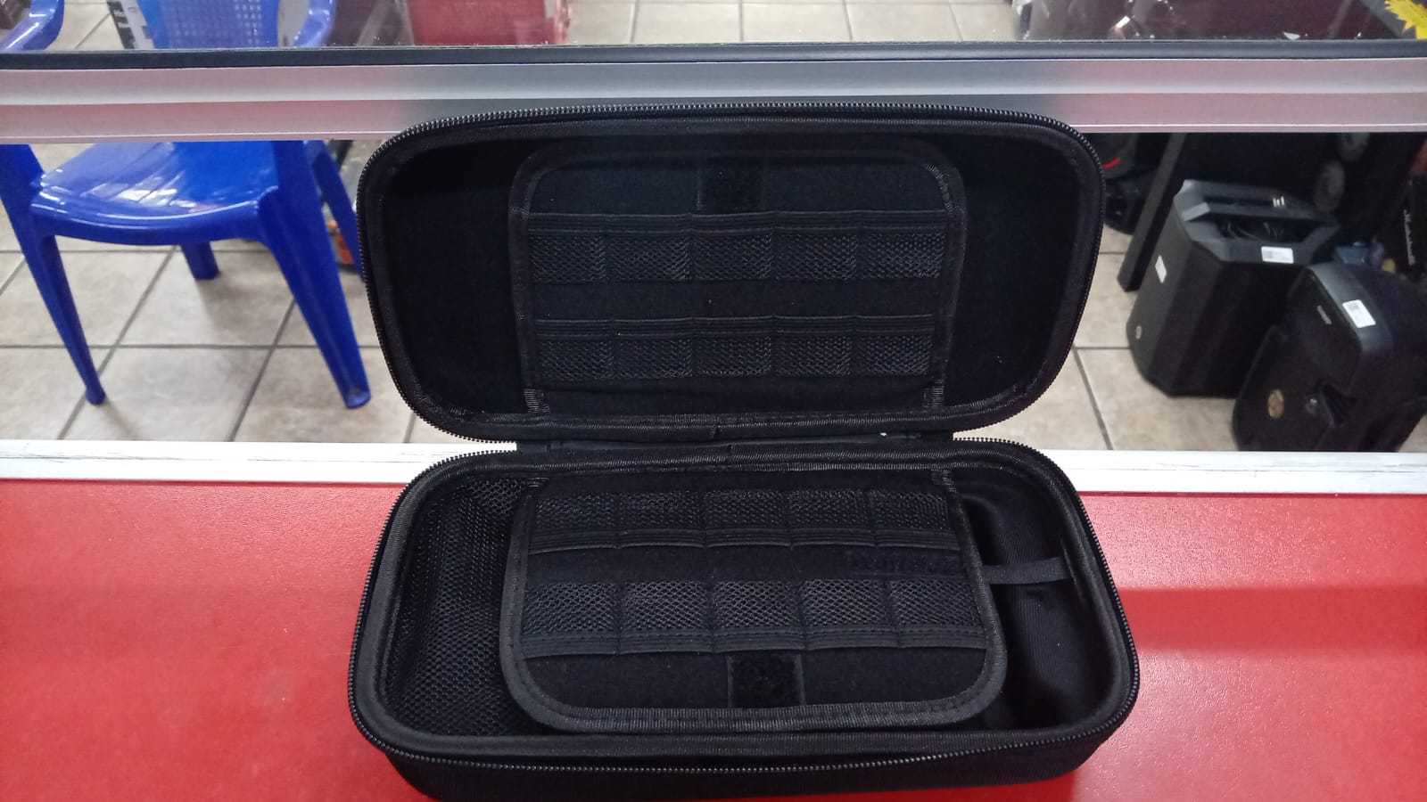 Precio 16 000,00 Nintendo Switch Estuche para nintendo switch, con cable de carga