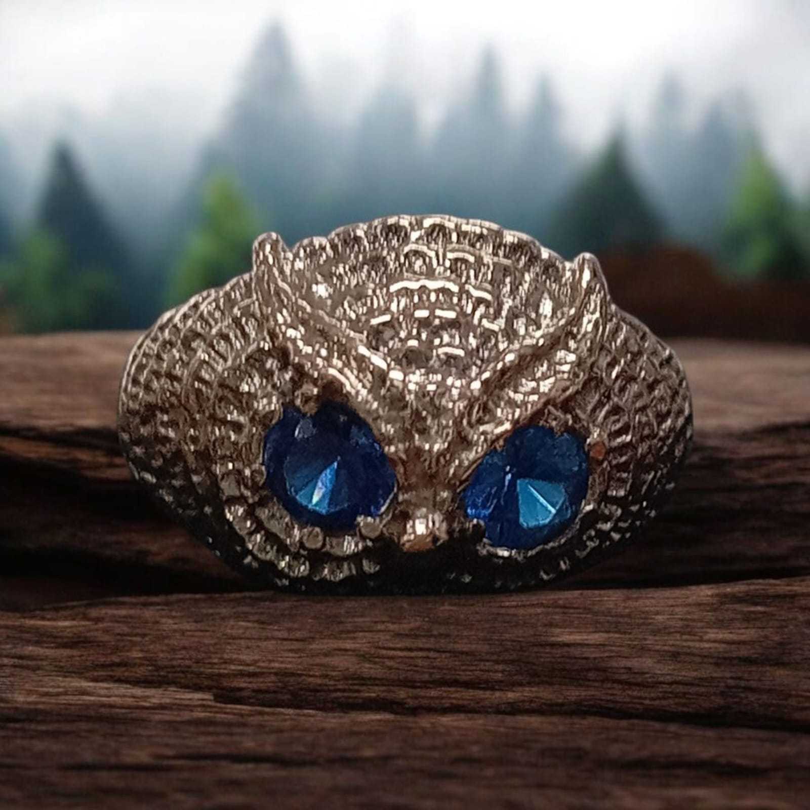 Precio 152 000,00   anillo buho ojos azules  talla 10