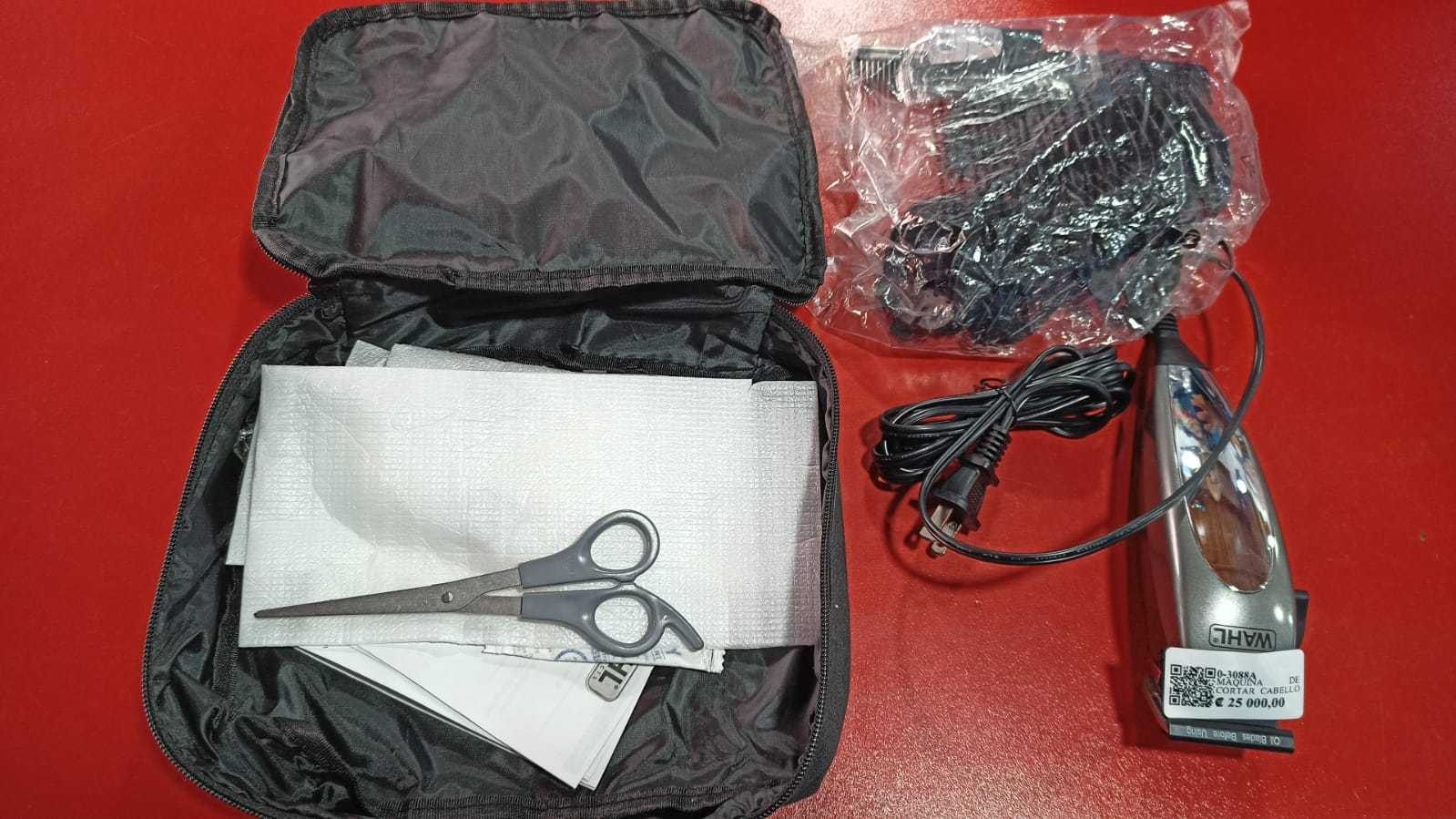 Precio 25 000,00 WAHL  MAQUINA DE CORTAR CABELLO WAHL CON ACCESORIOS Y BOLSO