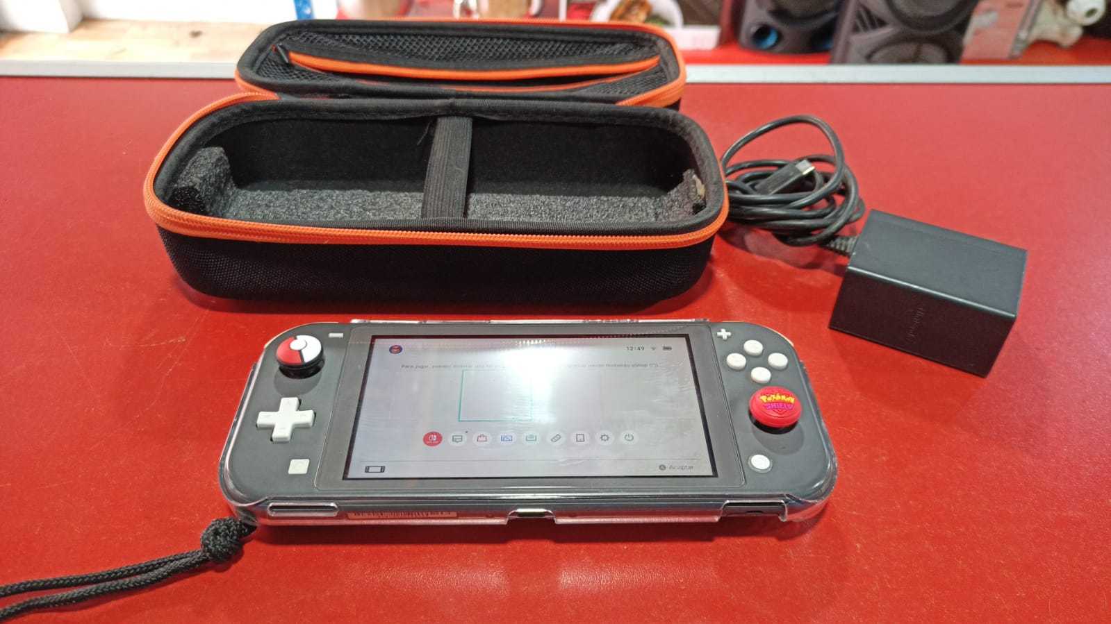 Precio 65 000,00 NINTENDO SWITCH CONSOLA Nintendo Switch LITE CON ESTUCHE Y CARGADOR