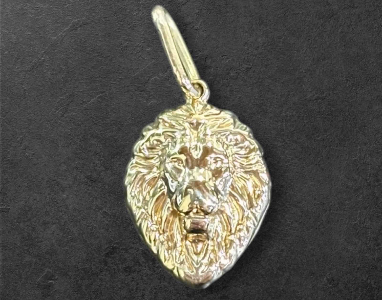 Precio 30 000,00   Dije leon 1.5cm 1g 10k