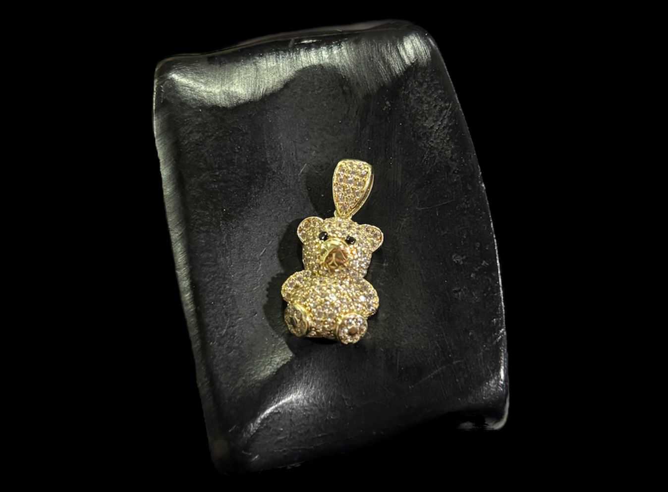 Precio 65 000,00   Dije oso zirconia 2cm 2.4g 10k